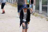 Les écoliers participent à un concours de pétanque en triplettes